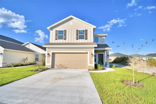 view of front of house featuring a garage and a front lawn