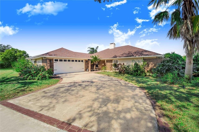 ranch-style home with a garage and a front lawn