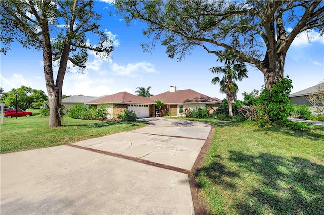 ranch-style house with a front yard and a garage