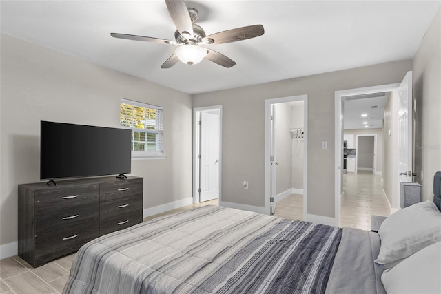 bedroom featuring ceiling fan and light hardwood / wood-style floors