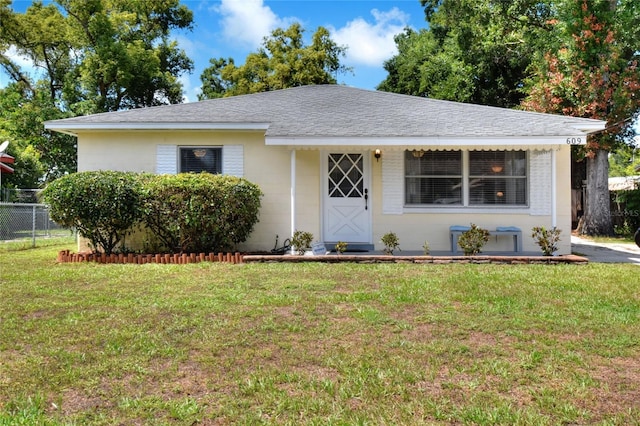 view of front of home with a front lawn