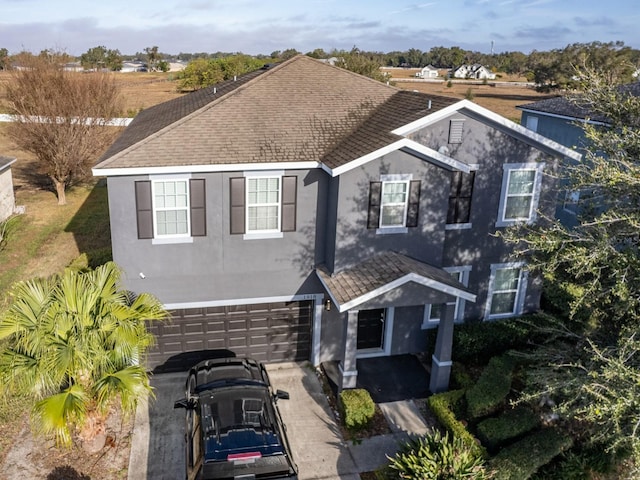 front of property featuring a garage