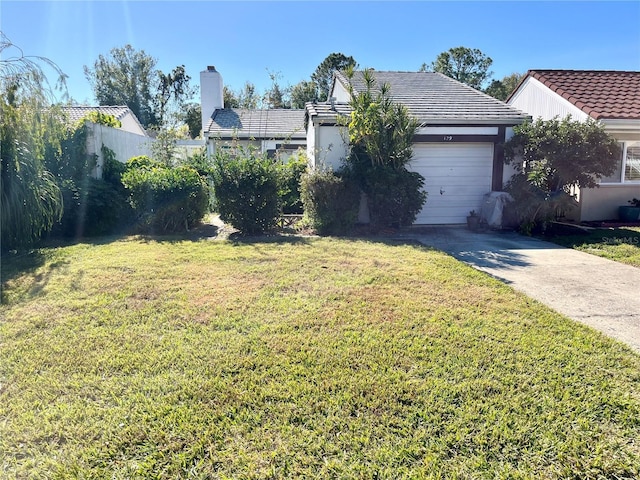 view of yard featuring a garage