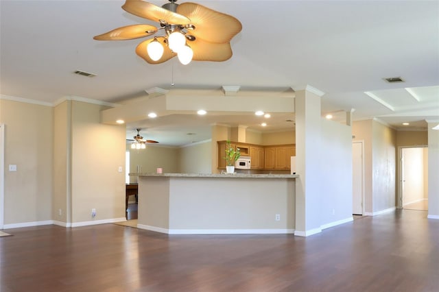 unfurnished living room with ornamental molding and dark hardwood / wood-style floors