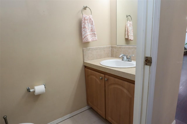 bathroom with vanity and tile patterned floors