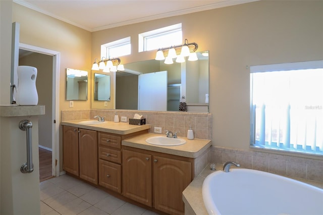 bathroom with crown molding, tile patterned flooring, backsplash, vanity, and a tub