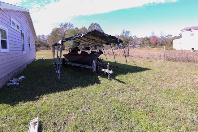 view of yard featuring a carport