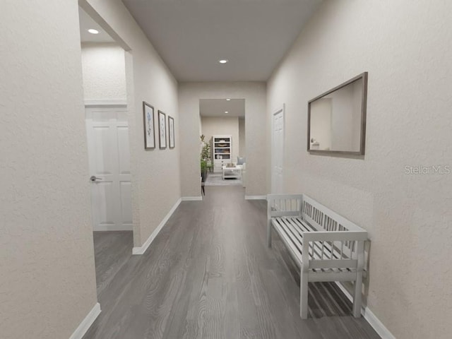 corridor with dark hardwood / wood-style floors