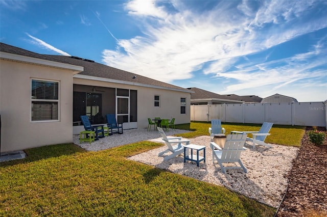 view of yard featuring a patio and a fire pit