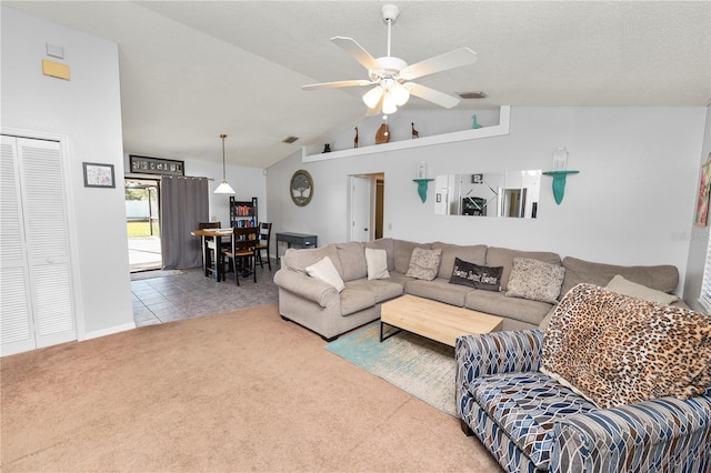 living room with carpet, a textured ceiling, high vaulted ceiling, and ceiling fan