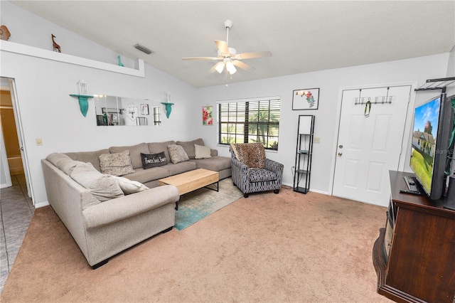 living room featuring light carpet, ceiling fan, and lofted ceiling