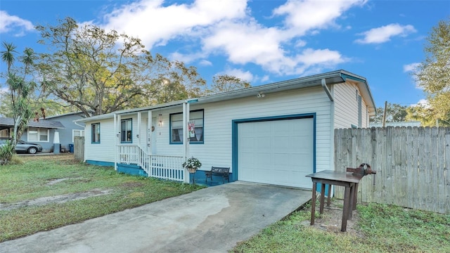 ranch-style home with a front lawn and a garage