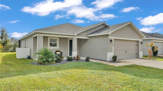 view of front facade featuring a garage and a front lawn