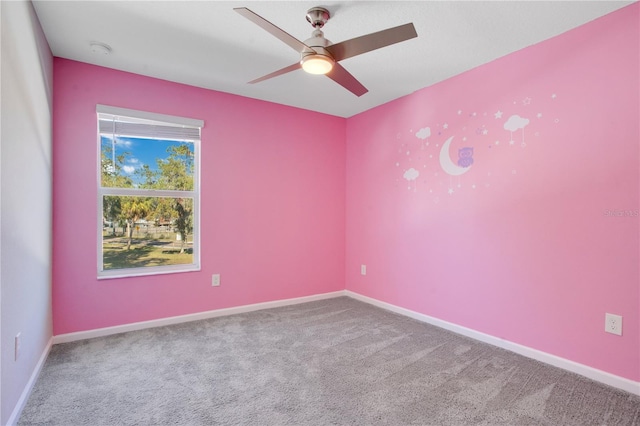 unfurnished room featuring carpet and ceiling fan