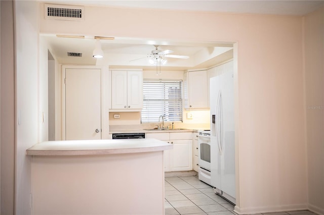 kitchen featuring kitchen peninsula, white appliances, ceiling fan, sink, and white cabinets