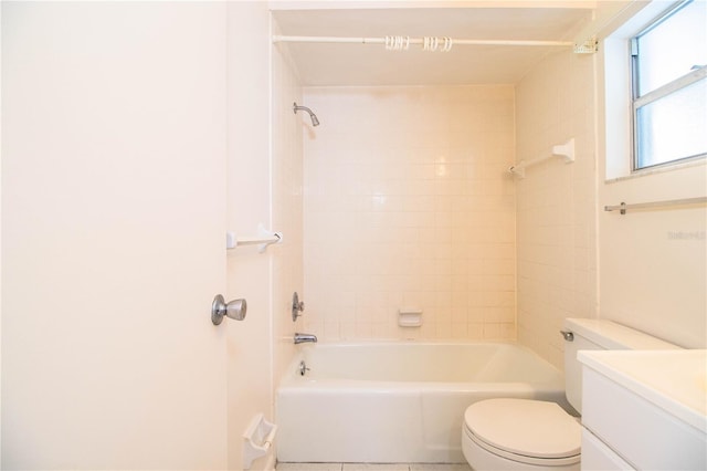 full bathroom featuring vanity, toilet, and tiled shower / bath