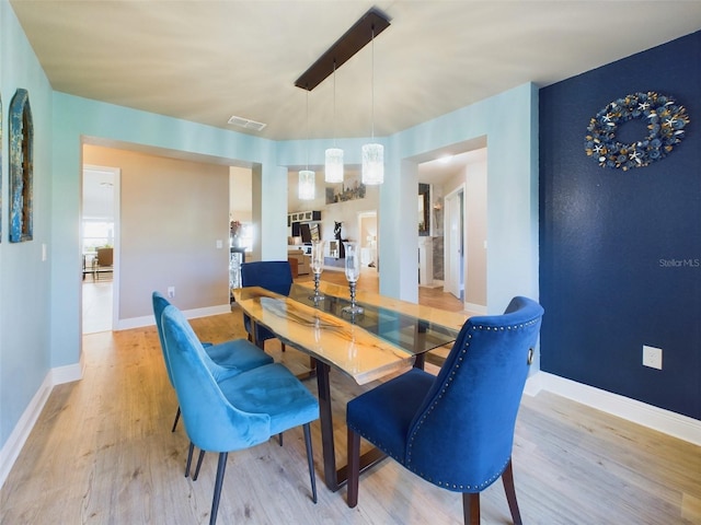 dining room featuring light wood-type flooring