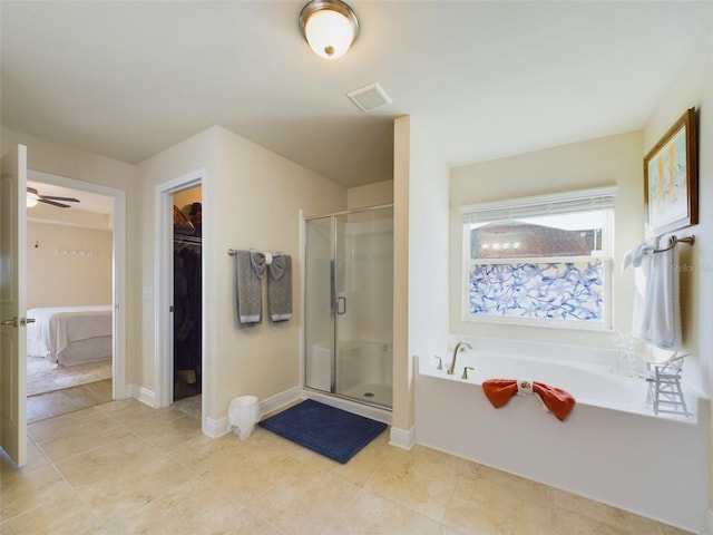 bathroom with tile patterned floors and plus walk in shower