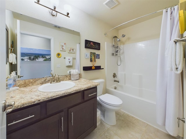 full bathroom with vanity, shower / tub combo, tile patterned floors, and toilet