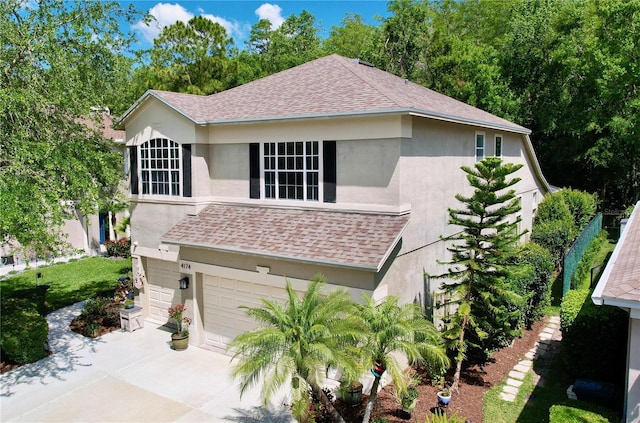 view of front of property with a garage