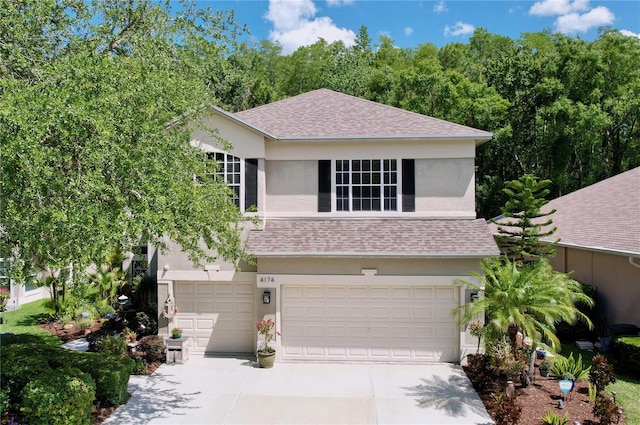 view of property featuring a garage