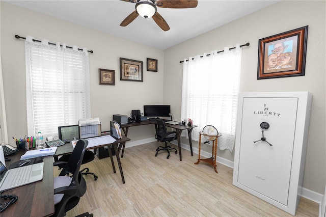 office area featuring ceiling fan and light hardwood / wood-style floors