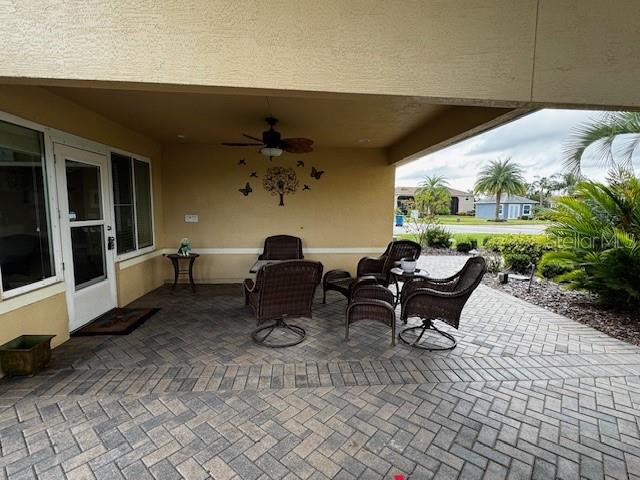 view of patio / terrace with ceiling fan