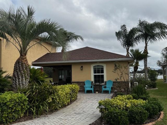 back of house featuring a patio area