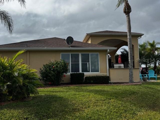 view of home's exterior featuring a yard