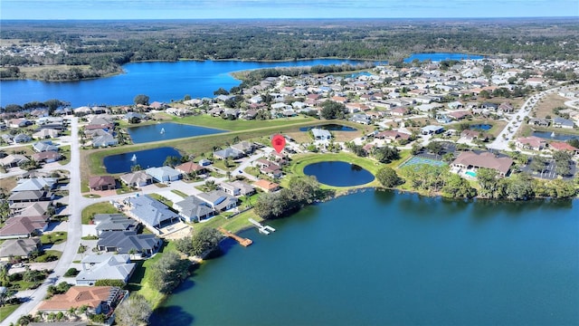 bird's eye view with a water view