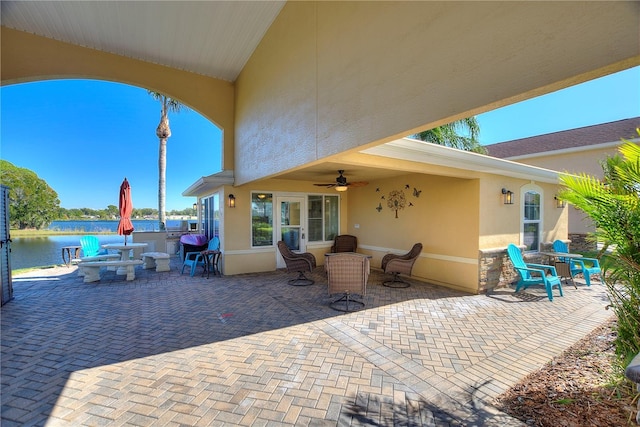 view of patio / terrace with a water view