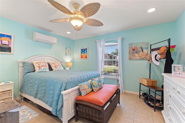 bedroom featuring ceiling fan, light tile patterned floors, and a wall mounted air conditioner