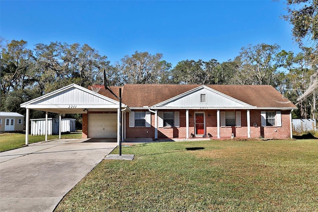 ranch-style house featuring covered porch, a garage, and a front lawn