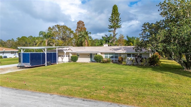 ranch-style house featuring a front lawn