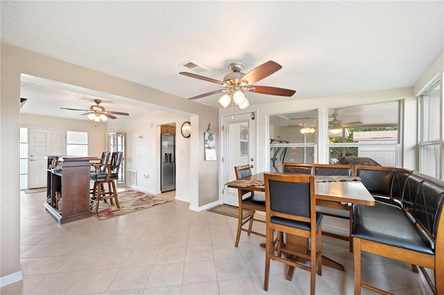 dining area featuring a textured ceiling