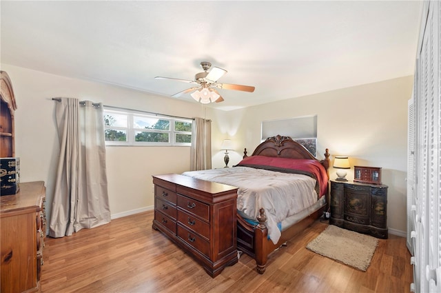 bedroom featuring ceiling fan and light wood-type flooring