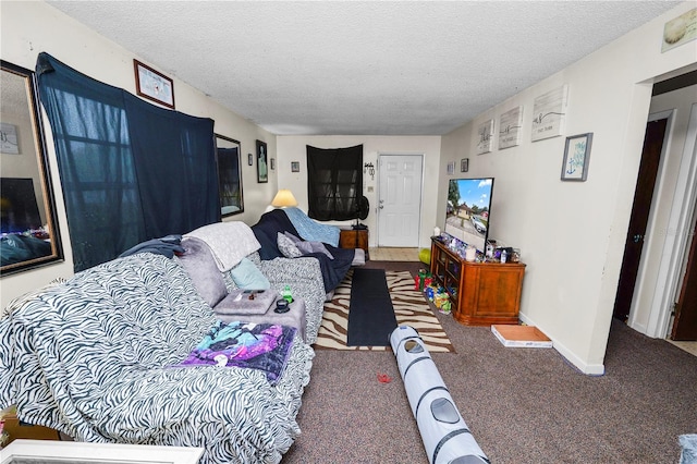 living room with carpet floors and a textured ceiling