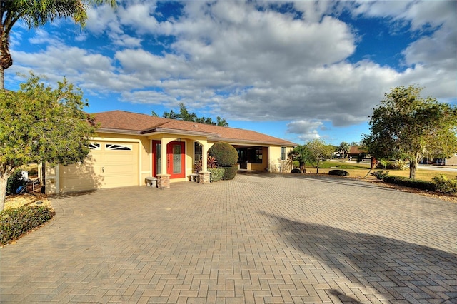 view of front of home with a garage