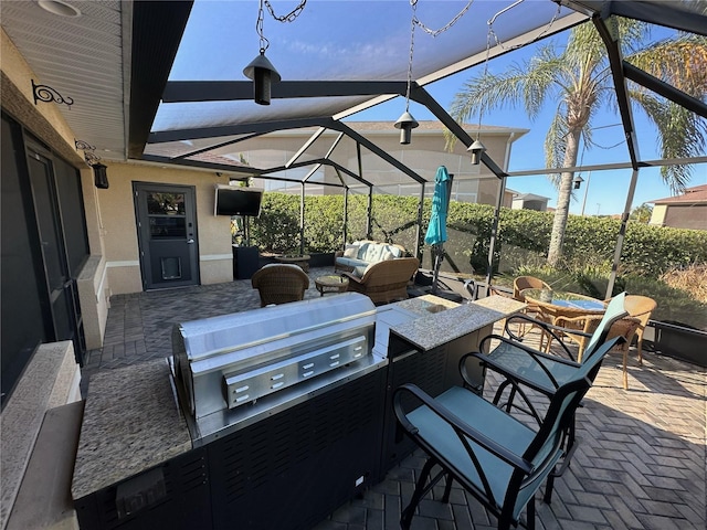view of patio / terrace with an outdoor living space and a lanai