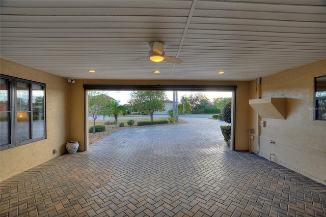 garage with ceiling fan