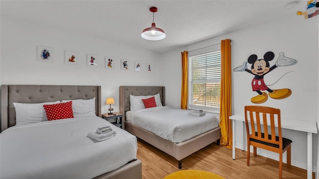 bedroom featuring light hardwood / wood-style floors