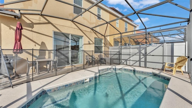 view of pool featuring a patio area and a lanai