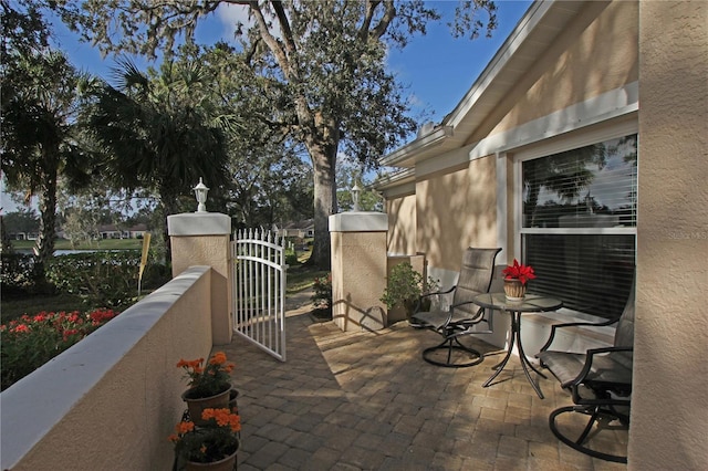 view of patio with a balcony