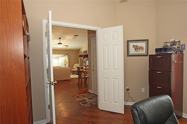 interior space with ceiling fan and lofted ceiling