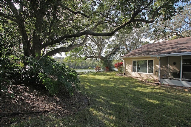 view of yard with a water view