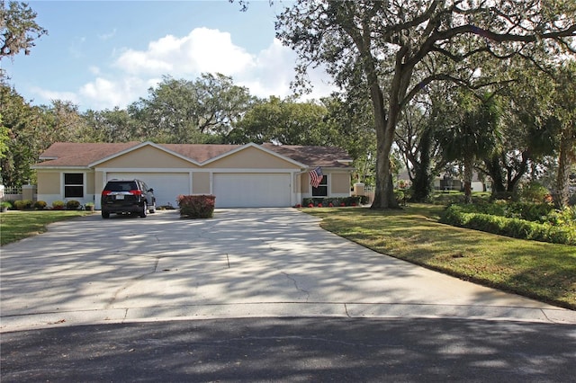 ranch-style home featuring a garage