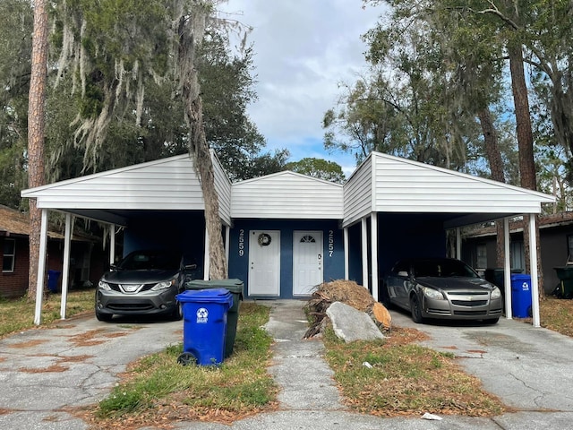 view of front facade with a carport