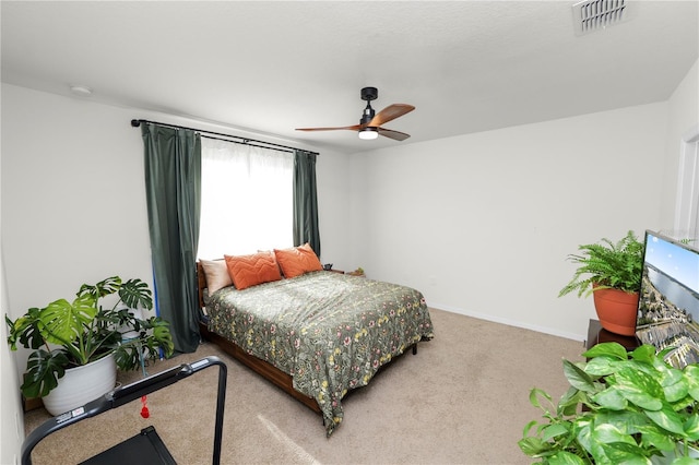 bedroom with carpet flooring and ceiling fan