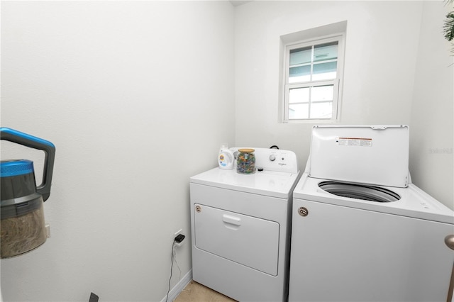 washroom with separate washer and dryer