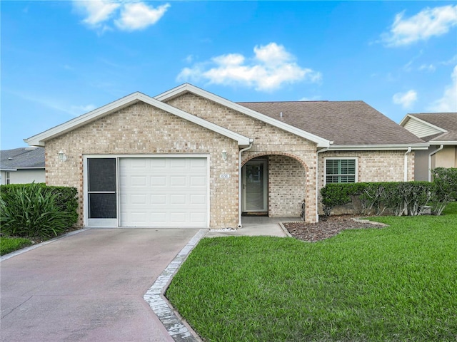 ranch-style house with a garage and a front yard